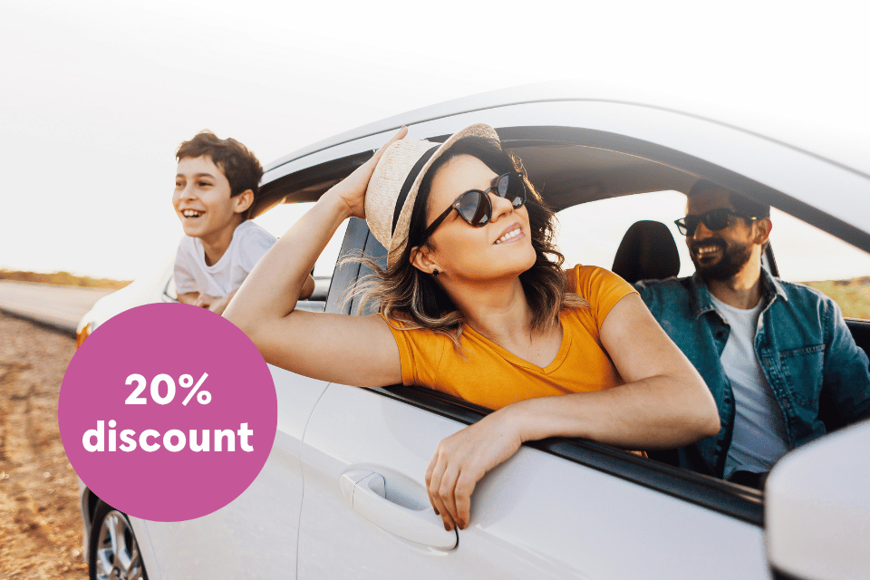 A family enjoying a ride in their insured vehicle.